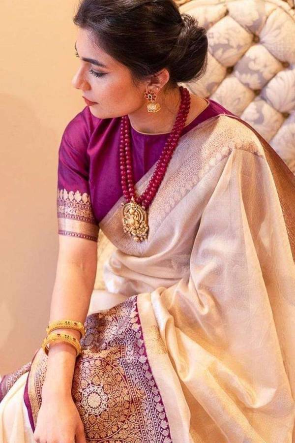 A Rich Pallu Saree with Heavy Border and Golden Flower Design  in Surat