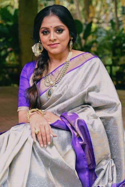 A Saree Adorned with AllOver Floral and Zari Weaving Design Manufacturers in Surat