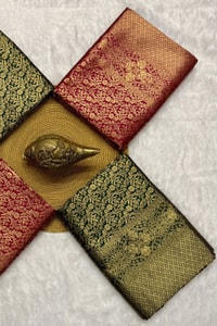 All-Over Zari Brocade Banarasi Soft Silk Saree in Bottle Green and Rose Maroon  in Surat