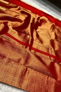 All-Over Zari Brocade Banarasi Soft Silk Saree with Contrast Gold Border in Red and Wine  in Surat