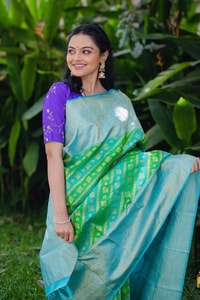 Aqua Banarasi Soft Silk Saree with Green Patola-Style Geometric Weave and Silver Zari Border  in Surat