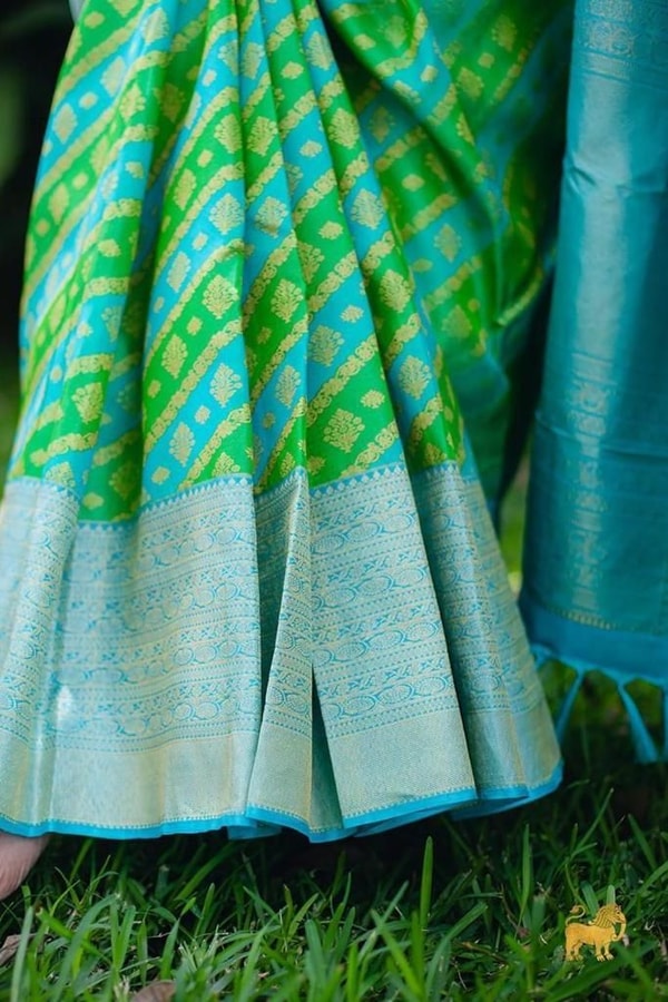 Aqua Banarasi Soft Silk Saree with Green Patola-Style Geometric Weave and Silver Zari Border  in Surat