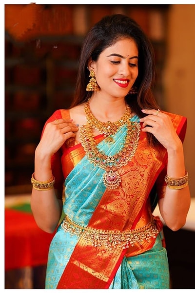 Aqua Green Banarasi Soft Silk Saree with Contrast Rust Orange Zari Border and Pallu in Surat
