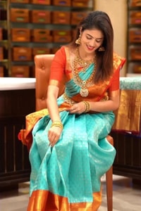 Aqua Green Banarasi Soft Silk Saree with Contrast Rust Orange Zari Border and Pallu  in Surat