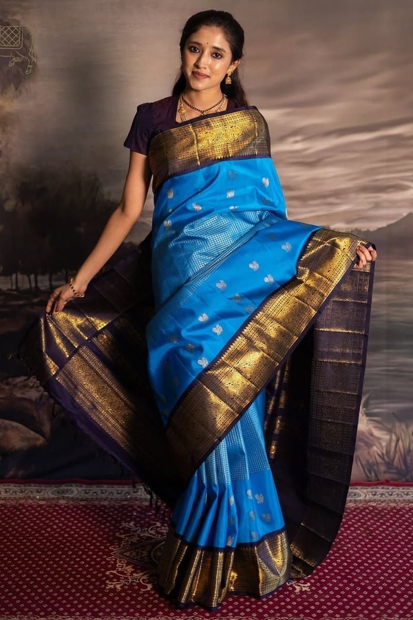 Azure Blue Banarasi Soft Silk Saree with Navy Zari Border and Silver Floral Buttas  in Surat
