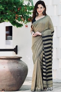 Beige and Black Saree with Bold Black Striped Pallu, Contrast Border and Tassels  in Surat