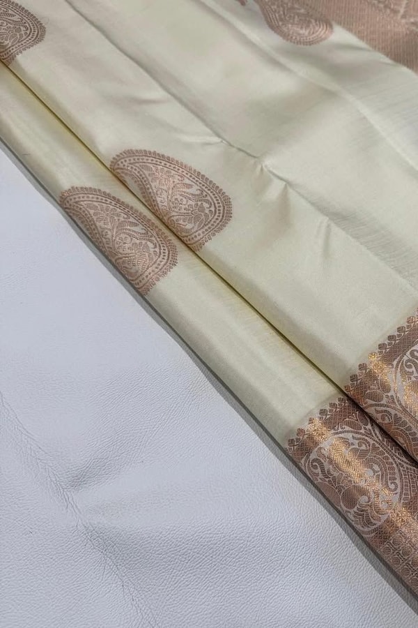 Big Paisley Butta Banarasi Soft Silk Saree with Copper Zari Border in Cream and Navy Blue  in Surat