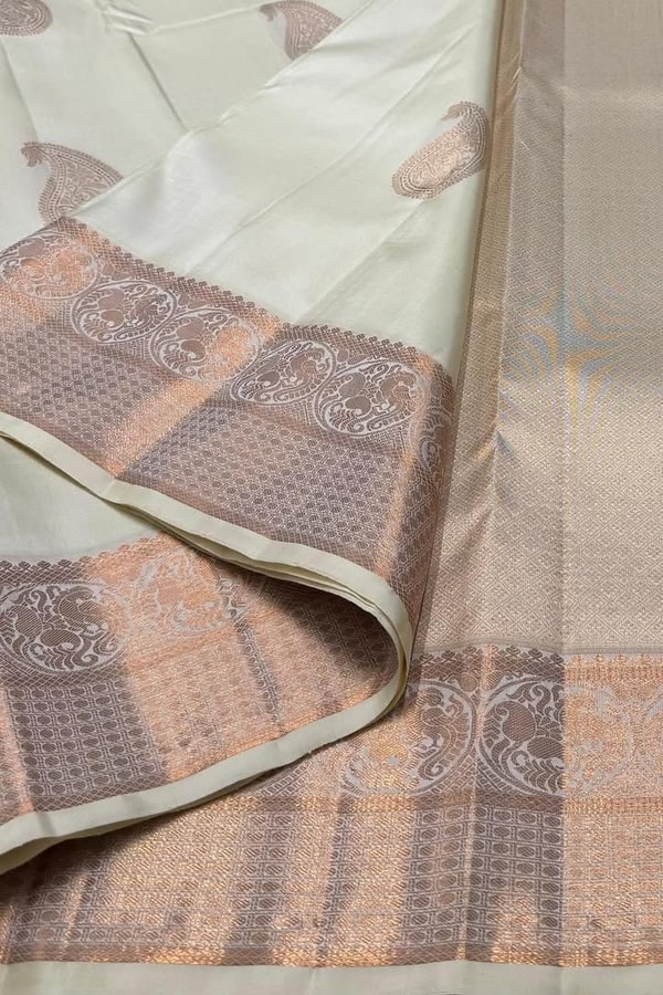 Big Paisley Butta Banarasi Soft Silk Saree with Copper Zari Border in Cream and Navy Blue  in Surat