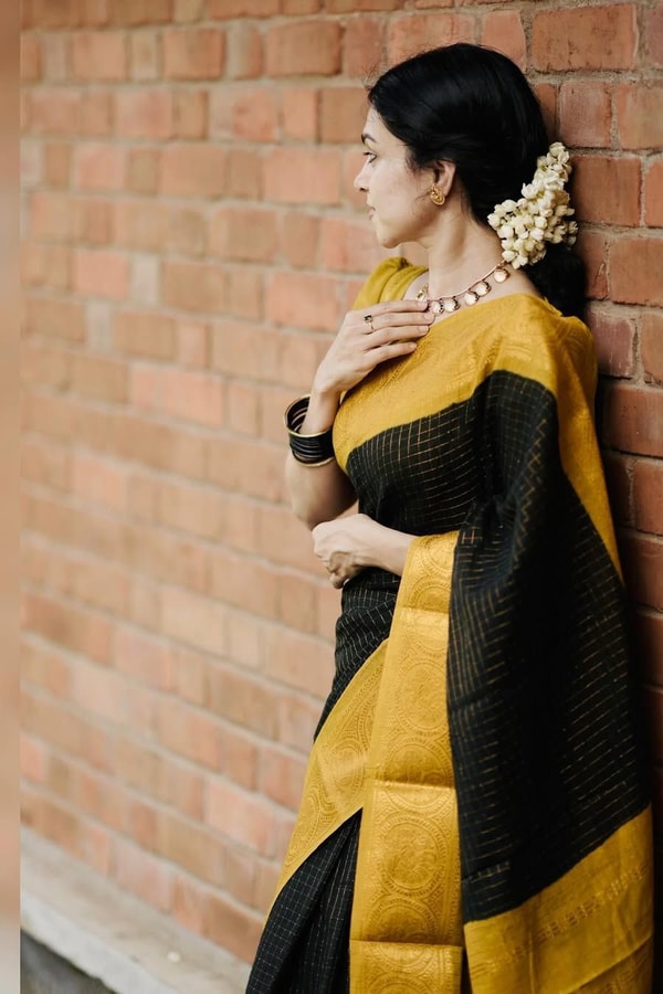 Black Banarasi Soft Silk Saree with Broad Mustard Yellow Border and Gold Zari Pallu  in Surat