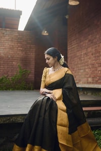 Black Banarasi Soft Silk Saree with Broad Mustard Yellow Border and Gold Zari Pallu  in Surat