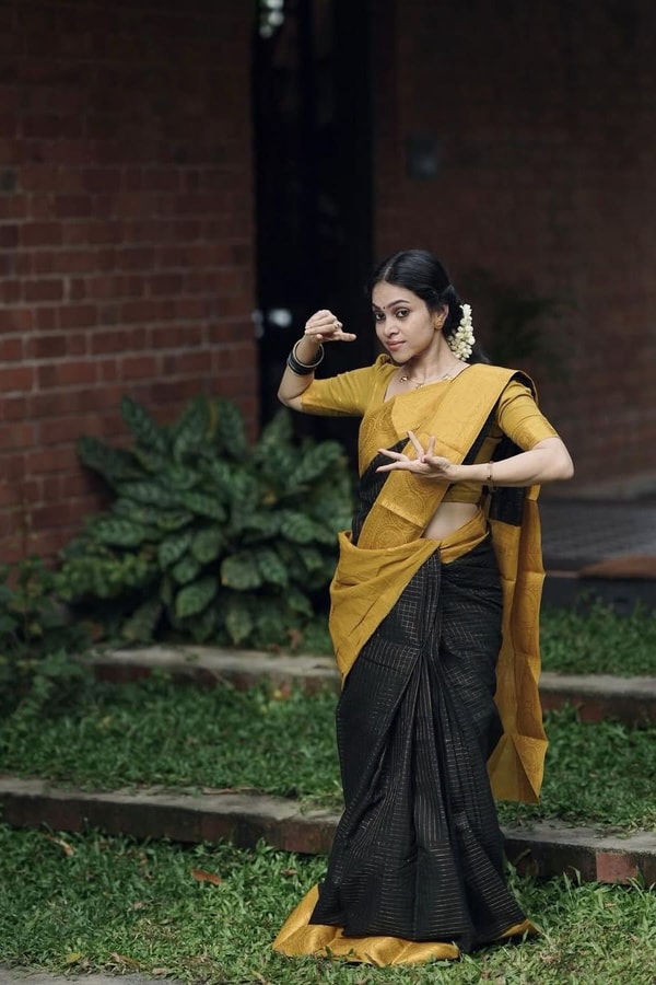 Black Banarasi Soft Silk Saree with Broad Mustard Yellow Border and Gold Zari Pallu  in Surat