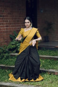 Black Banarasi Soft Silk Saree with Broad Mustard Yellow Border and Gold Zari Pallu  in Surat