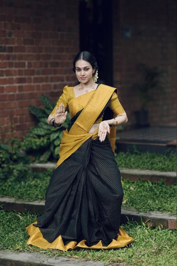 Black Banarasi Soft Silk Saree with Broad Mustard Yellow Border and Gold Zari Pallu  in Surat
