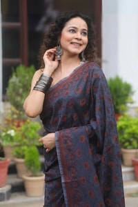 Black Banarasi Soft Silk Saree with Copper Zari Weave and Peach-Toned Woven Pallu  in Surat