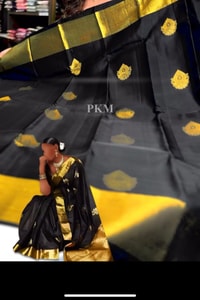 Black Banarasi Soft Silk Saree with Gold Zari Buttas and Broad Lemon Gold Border  in Surat
