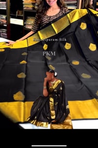 Black Banarasi Soft Silk Saree with Gold Zari Buttas and Broad Lemon Gold Border  in Surat