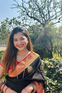 Black Banarasi Soft Silk Saree with Large Gold Floral Buttas and Burnt Orange Zari Border  in Surat