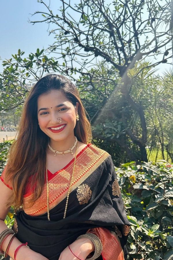 Black Banarasi Soft Silk Saree with Large Gold Floral Buttas and Burnt Orange Zari Border  in Surat