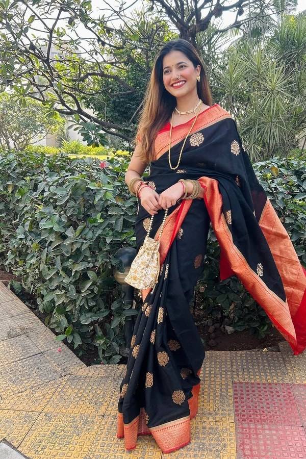 Black Banarasi Soft Silk Saree with Large Gold Floral Buttas and Burnt Orange Zari Border  in Surat