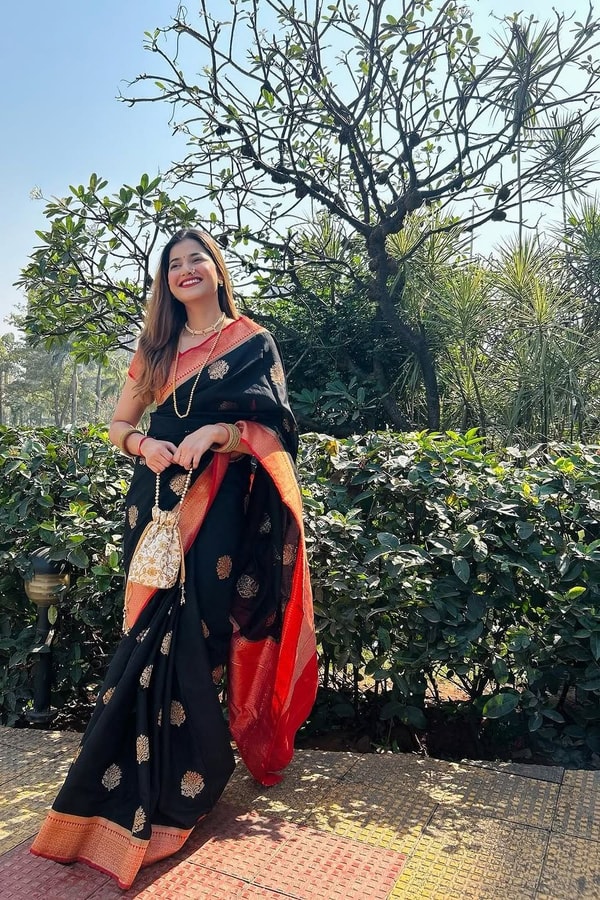 Black Banarasi Soft Silk Saree with Large Gold Floral Buttas and Burnt Orange Zari Border  in Surat