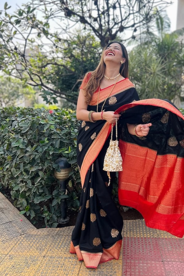 Black Banarasi Soft Silk Saree with Large Gold Floral Buttas and Burnt Orange Zari Border  in Surat