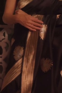Black Banarasi Soft Silk Saree with Large Gold Zari Floral Buttas and Striped Gold Border  in Surat video 2
