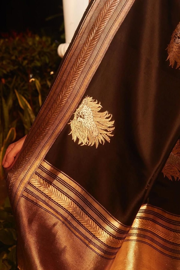 Black Banarasi Soft Silk Saree with Large Gold Zari Floral Buttas and Striped Gold Border  in Surat