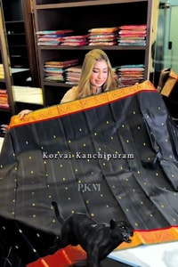 Black Banarasi Soft Silk Saree with Polka Zari Dots, Orange Border and Red Contrast Pallu  in Surat video 2