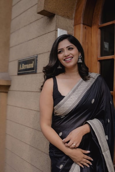 Black Banarasi Soft Silk Saree with Silver Zari Buttis and Broad Silver-Grey Woven Border in Surat