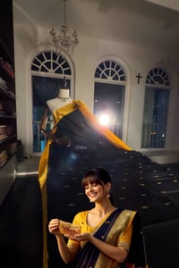 Black Banarasi Soft Silk Saree with Tiny Gold Buttis and Mustard Yellow Zari Pallu  in Surat