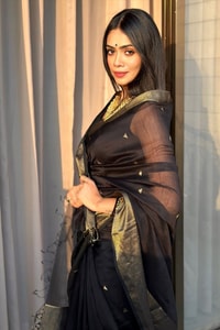 Black Saree with Antique Gold Zari Border, Small Buttis and Sheer Tissue-Look Pallu  in Surat