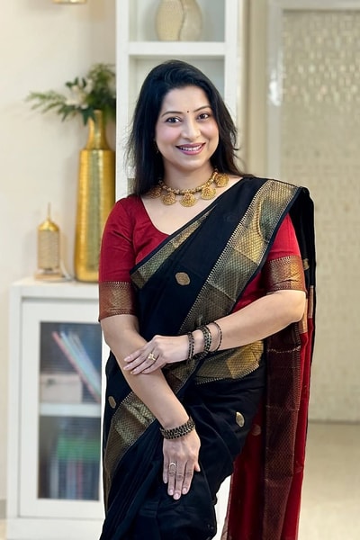 Black Saree with Gold Zari Border and Red Striped Contrast Pallu in a Classic Look in Surat