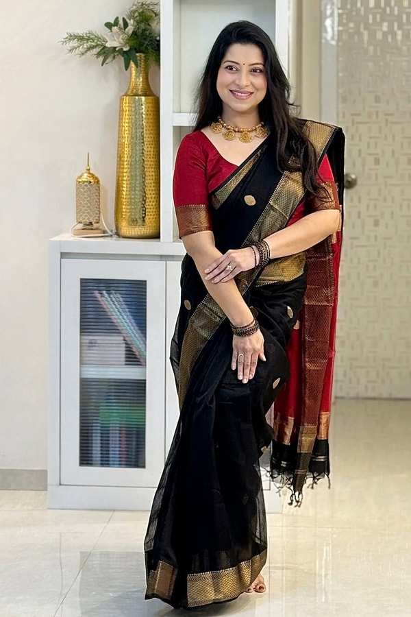 Black Saree with Gold Zari Border and Red Striped Contrast Pallu in a Classic Look  in Surat