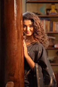 Black Saree with Gold Zari Buttis, Thin Gold Border and Tasselled Zari Pallu  in Surat