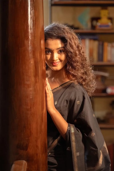 Black Saree with Gold Zari Buttis, Thin Gold Border and Tasselled Zari Pallu in Surat