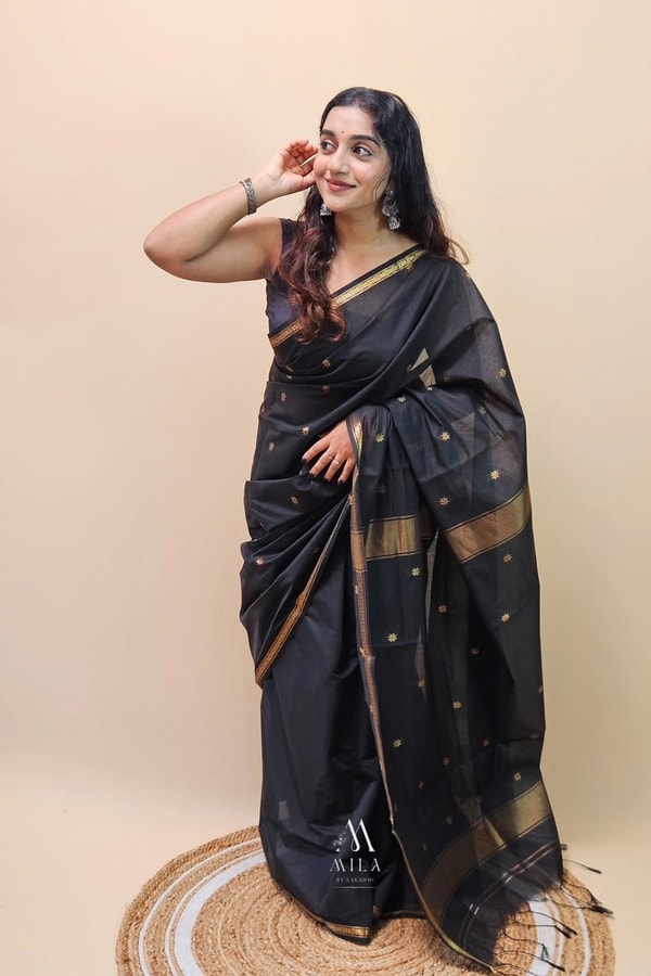 Black Saree with Gold Zari Buttis, Thin Gold Border and Tasselled Zari Pallu  in Surat