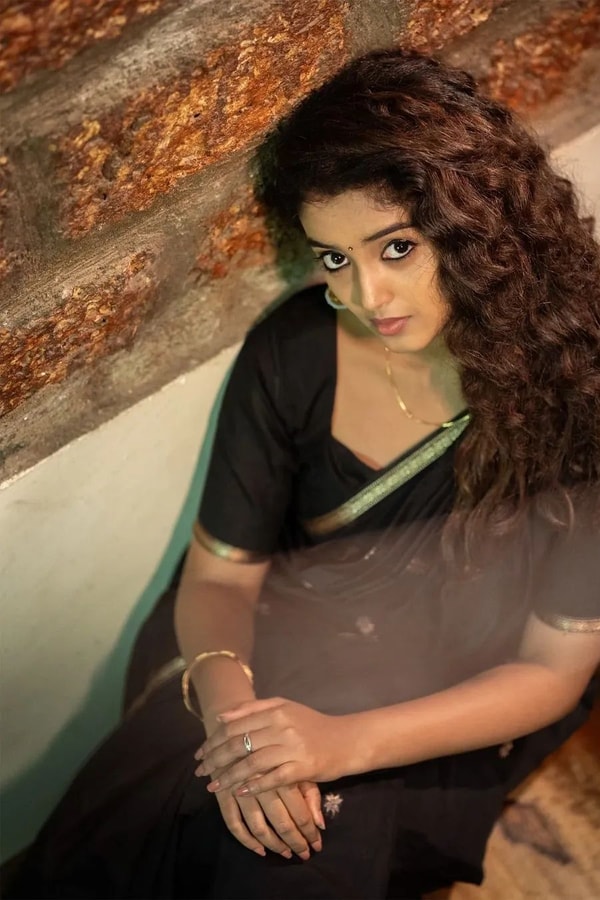 Black Saree with Gold Zari Buttis, Thin Gold Border and Tasselled Zari Pallu  in Surat