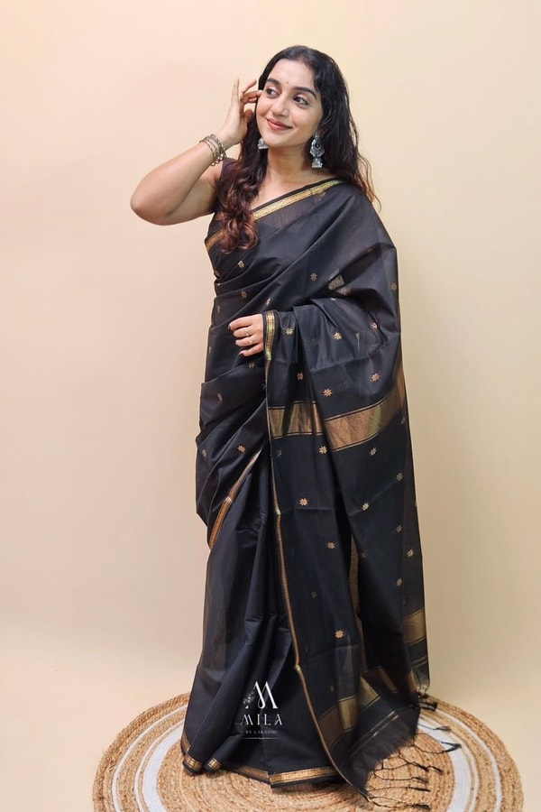 Black Saree with Gold Zari Buttis, Thin Gold Border and Tasselled Zari Pallu  in Surat