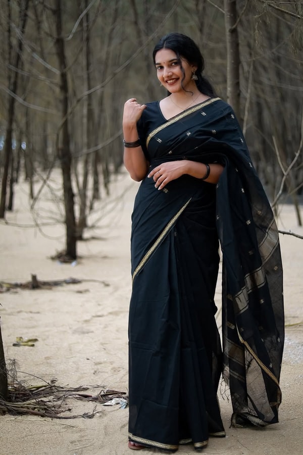 Black Saree with Gold Zari Buttis, Thin Gold Border and Tasselled Zari Pallu  in Surat