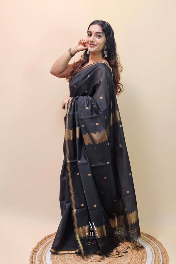 Black Saree with Gold Zari Buttis, Thin Gold Border and Tasselled Zari Pallu  in Surat