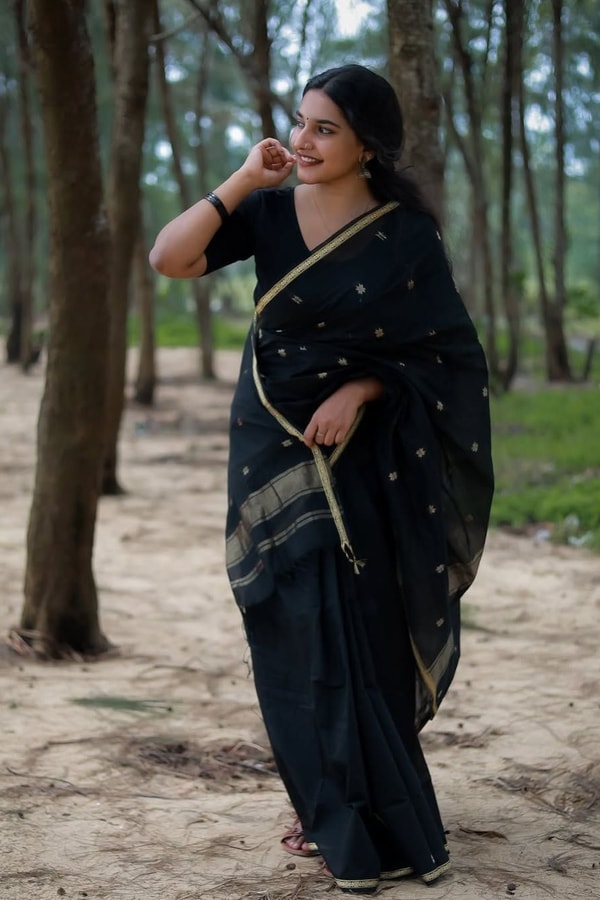 Black Saree with Gold Zari Buttis, Thin Gold Border and Tasselled Zari Pallu  in Surat