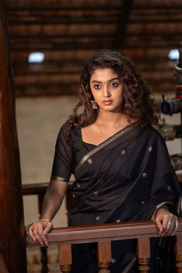 Black Saree with Gold Zari Buttis, Thin Gold Border and Tasselled Zari Pallu  in Surat