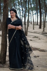 Black Saree with Gold Zari Buttis, Thin Gold Border and Tasselled Zari Pallu  in Surat