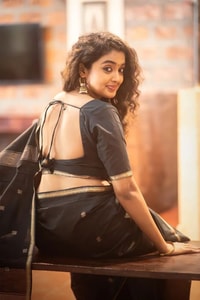 Black Saree with Gold Zari Buttis, Thin Gold Border and Tasselled Zari Pallu  in Surat