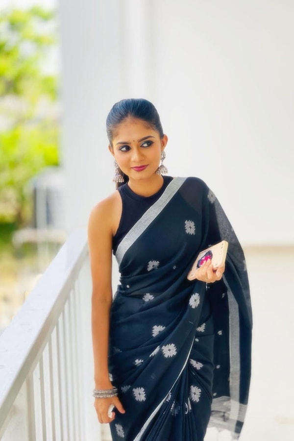 Black Saree with Silver Star Buttis and Silver Stripe Border for Minimal Festive Style  in Surat
