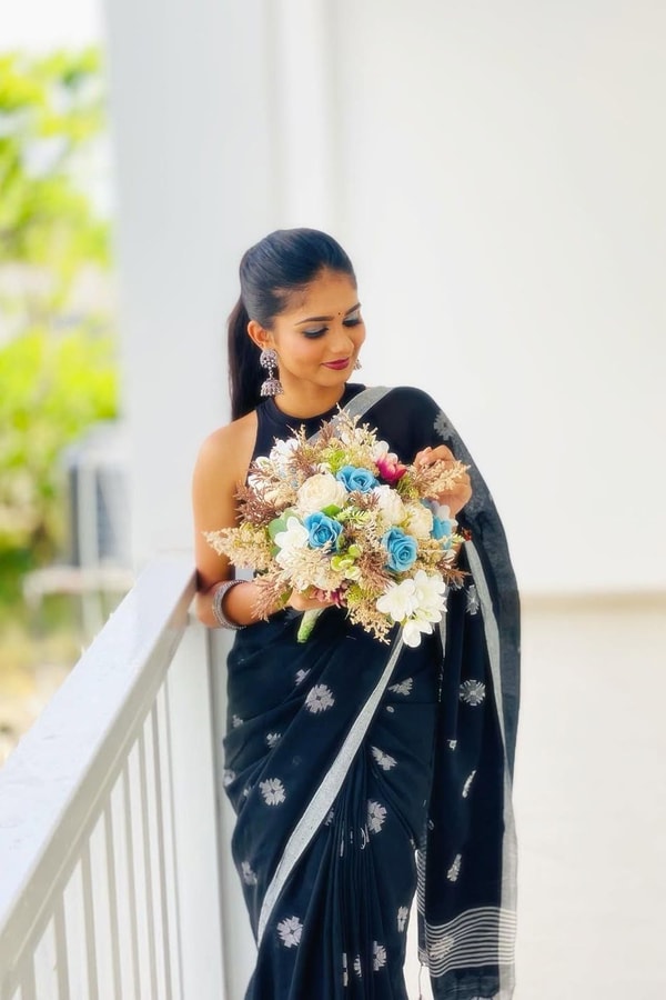 Black Saree with Silver Star Buttis and Silver Stripe Border for Minimal Festive Style  in Surat