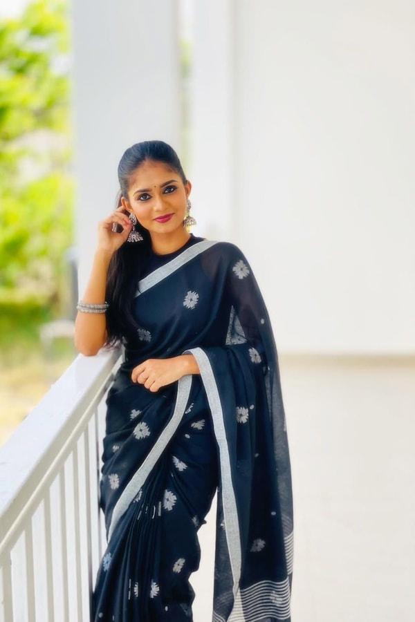 Black Saree with Silver Star Buttis and Silver Stripe Border for Minimal Festive Style  in Surat