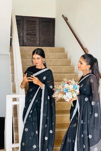 Black Saree with Silver Star Buttis and Silver Stripe Border for Minimal Festive Style  in Surat