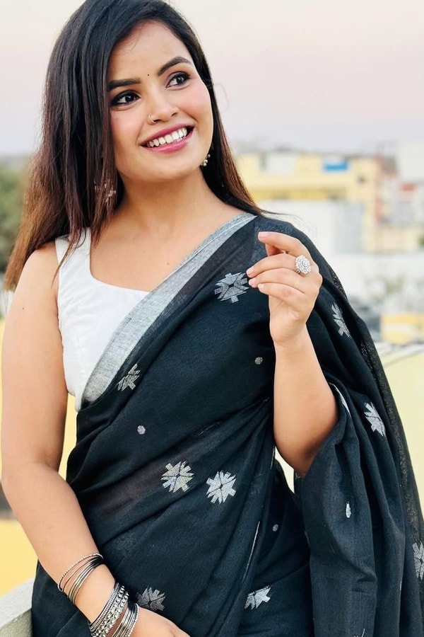 Black Saree with Silver Star Buttis and Silver Stripe Border for Minimal Festive Style  in Surat