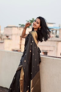 Black and Antique Gold Banarasi Soft Silk Saree with Polka Buttis and Broad Zari Border  in Surat